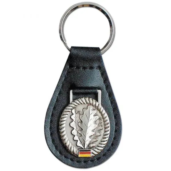 Schlüsselanhänger mit Barettabz.